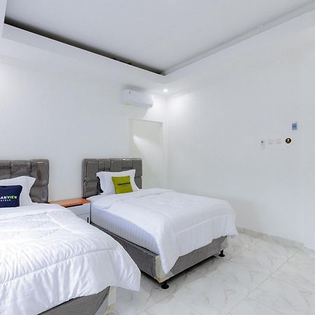 Urbanview Hotel Amira Syariah Bogor Pamoyanan Exterior photo